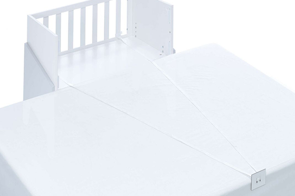 Joining strips for co-sleeping crib 