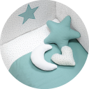Aquamarine bedding for baby's cot